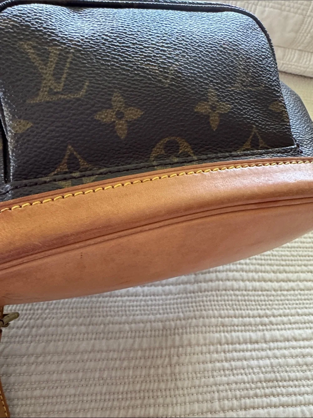 Louis Vuitton Monogram Drawstring Mini Backpack in Brown and Tan Leather Trim